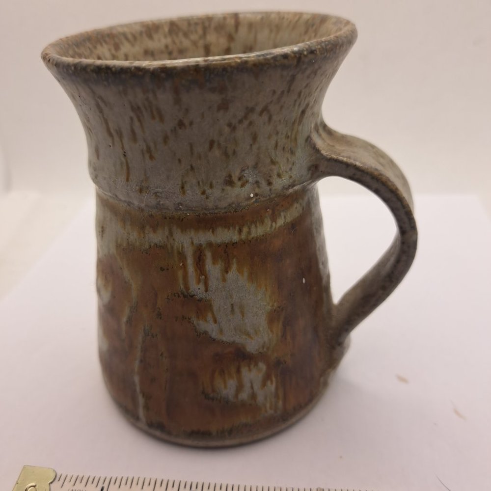 Ceramic pottery mug.